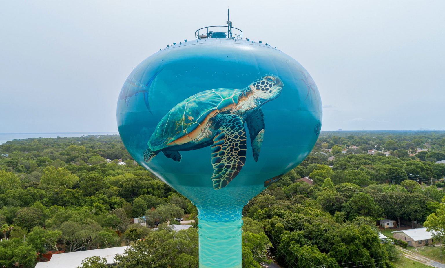 Muralist Depicts Oceanscape On Award Winning Water Tank In Destin