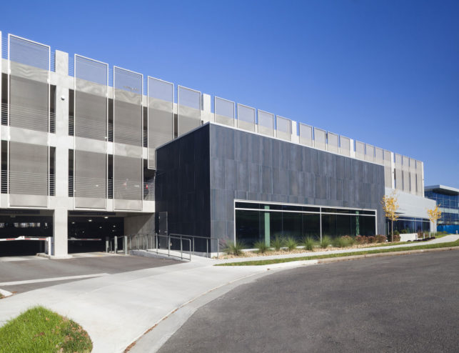 Metal Mesh On Modern Parking Garage Enriched With Lumiflon FEVE Resin ...