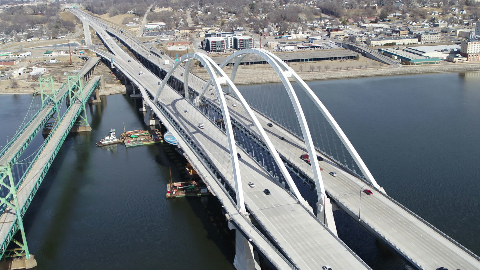 Massive RiverCrossing Arches Complete New I74 Mississippi River Bridge Lumiflon FEVE Resins