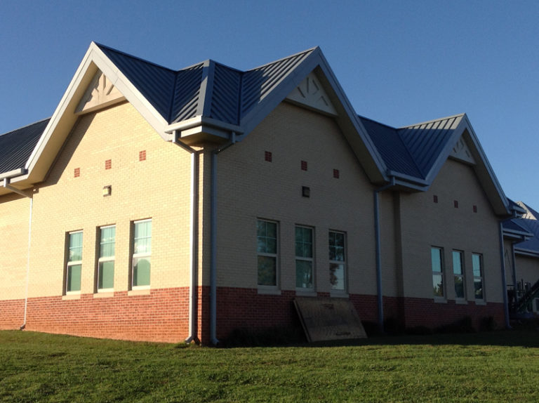 Elementary School Roof Restoration With Flexible FEVE Fluoropolymer